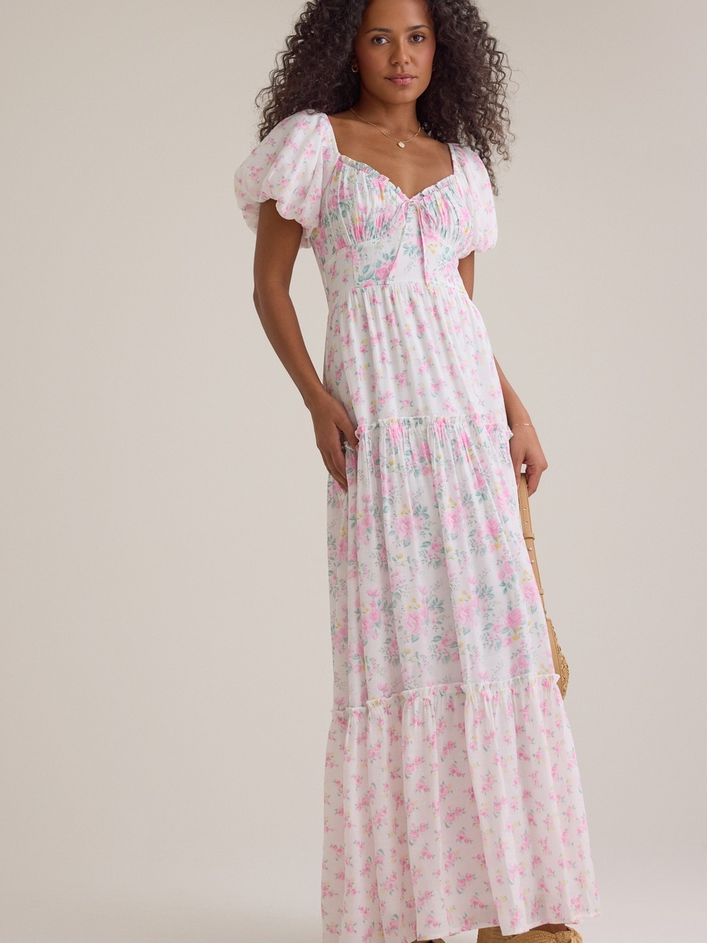 Rachel Tiered Floral Dress by the brand Altar'd State.